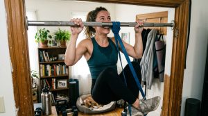 Using Doorway Friction to Safely Master Your First Assisted Pull-Up at Home